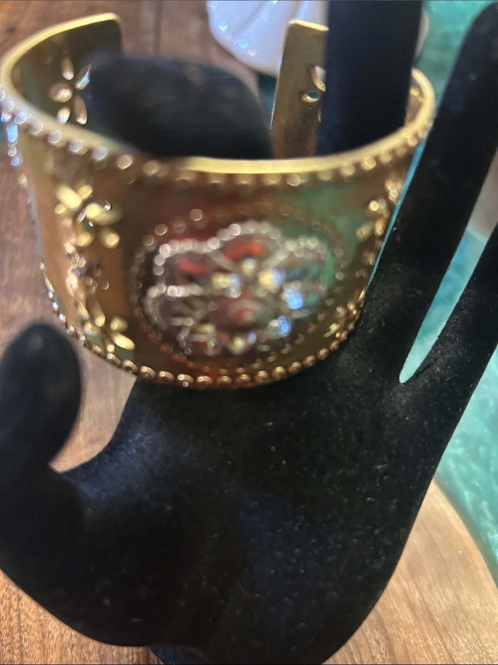 Lucky gold-tone floral cutout cuff bracelet intricate medallion center